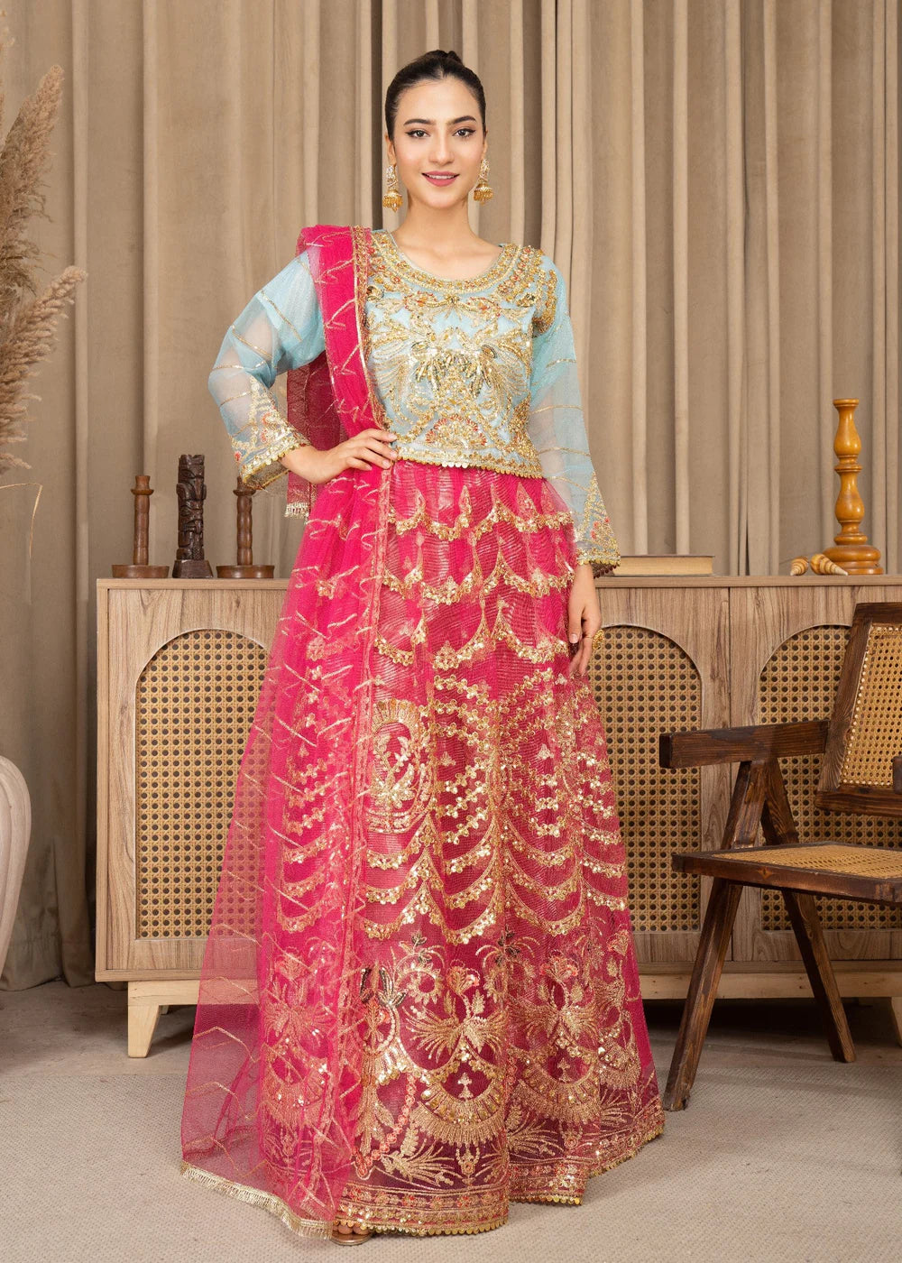 Vibrant Gold-Embroidered Lehenga in Pink and Blue
