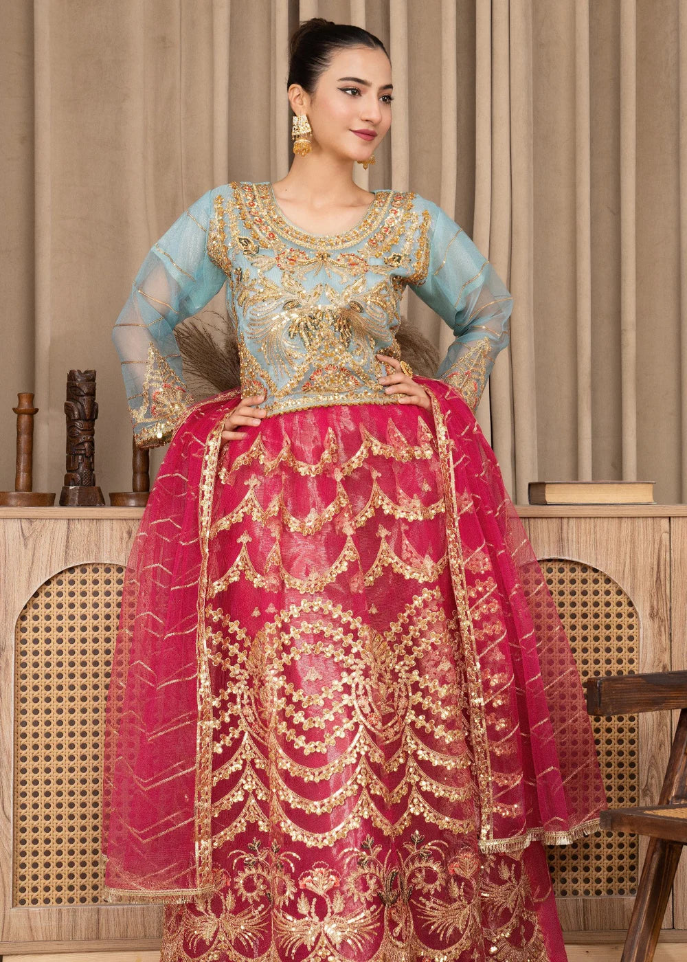 Vibrant Gold-Embroidered Lehenga in Pink and Blue