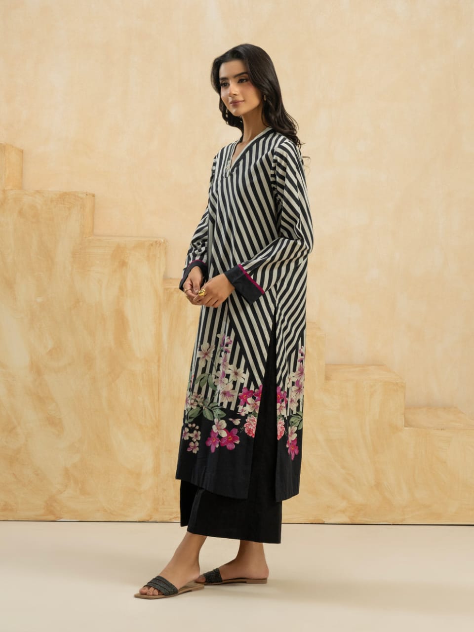 Chic Contrast: Black & White Striped with Floral Accents